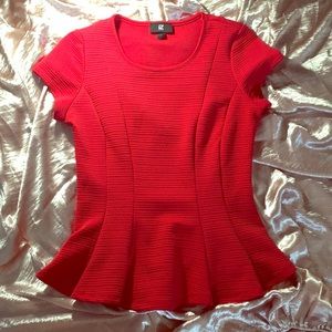 Red peplum slimming top